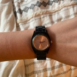 Nixon women’s watch with dark green band